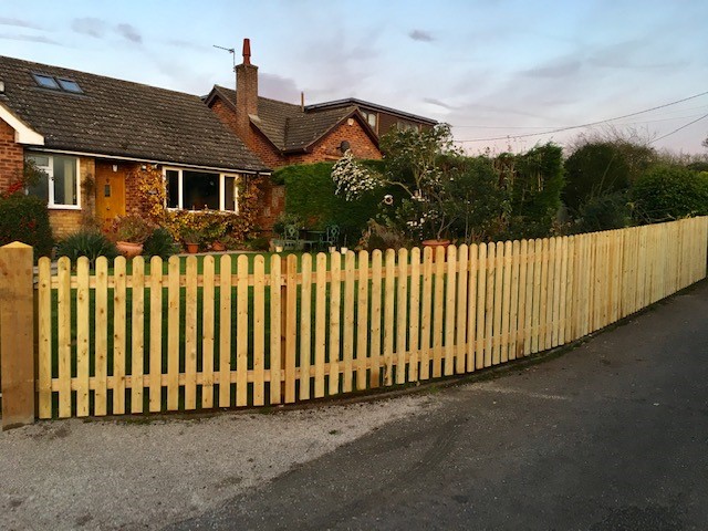 Wooden picket fence
